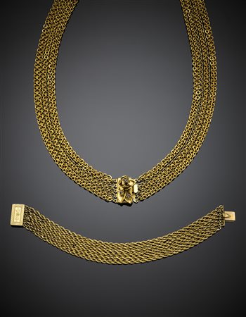 Lotto composto da collana a sette fili di maglia rolò piatta con chiusura...