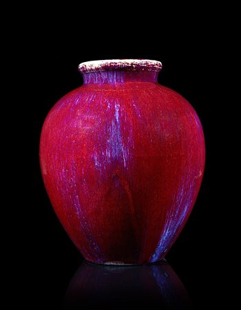 Vaso in porcellana ad invetriatura flambè nei toni del rosso e del viola...