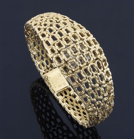 Omega: orologio/bracciale da polso in oro giallo. gr. tot 52,6.