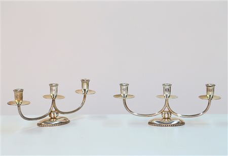 MANIFATTURA ITALIANA Coppia candelabri a tre fiamme. Argento. Cm 33,50 x...