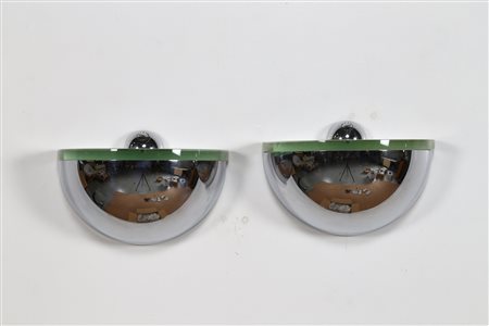 CELADA GIANNI (n. 1935) Coppia di appliques. Metallo cromato e vetro. Cm...