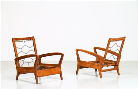 MANIFATTURA ITALIANA Coppia di poltrone letto . Legno e metallo. Cm 68,00 x...