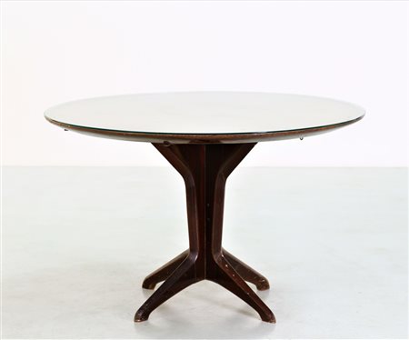 MANIFATTURA ITALIANA Tavolo . Legno di noce e vetro. Cm 120,00 x 77,00 x...