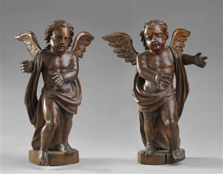 SCULTORE VENETO DEL XVIII SECOLO Coppia di angeli in legno scolpito. . . Cm...
