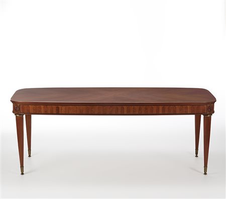 Paolo Buffa (Milano 1903 - Milano 1970)Tavolo allungabile di forma ovoidale....