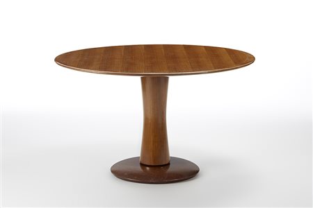 Paolo Buffa (Milano 1903 - Milano 1970)Tavolo con piano di forma circolare....