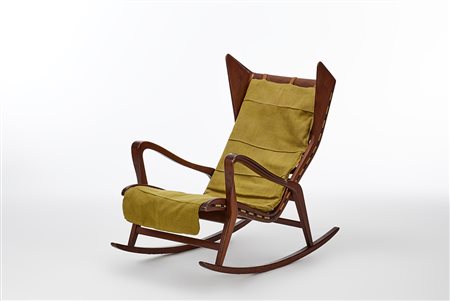 Cassina Poltrona modello "572". Meda, 1955. Legno di mogano, imbottitura...