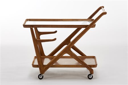 Cassina Carrello portavivande. Milano, anni '50. Struttura in legno di faggio...