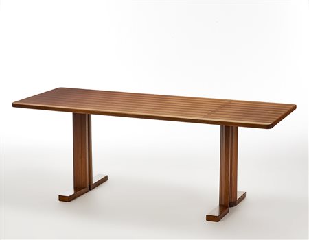 Tavolo in legno di teak massello. Nord Europa, anni '70. (cm 195x74x77,5)...