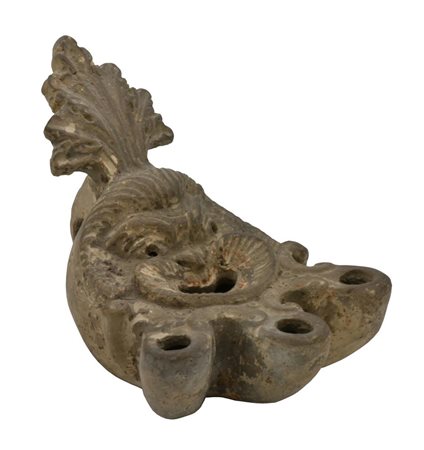 RARA LUCERNA TRILICNE DATAZIONE: II-III sec. d.C. MATERIA E TECNICA: argilla...