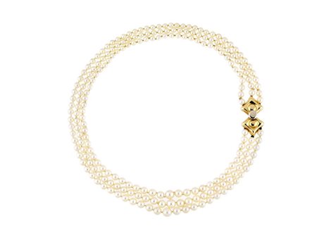 COLLANA IN ORO GIALLO E PERLE COLTIVATE realizzata a tre fili di perle...