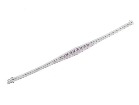 BRACCIALE, UNOAERRE, IN ORO BIANCO E RUBINI a nastro sagomato realizzato a...