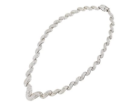 COLLANA IN ORO BIANCO E DIAMANTI montatura semirigida a maglie sagomate...