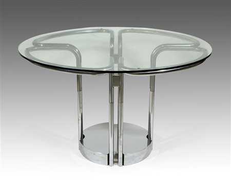 Tavolo rotondo con piano in vetro, base cromata. H. cm. 74, diam. cm. 120.