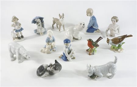 Lotto di vari oggetti in porcellana policroma tra cui uccelli, figure e animali.