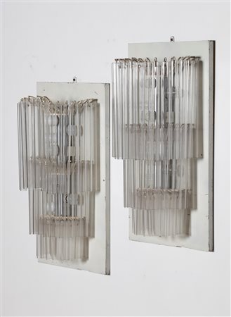 VENINI Coppia di lampade da parete. Vetro. Cm 35,00 x 70,00 x 21,00. Base in...