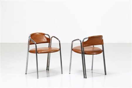 RINALDI GASTONE Coppia di poltroncine . Acciaio cromato e pelle. Cm 50,00 x...