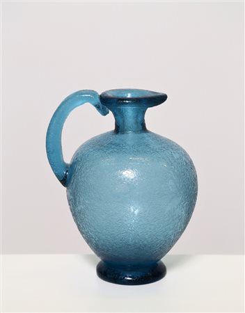 POLI FLAVIO (1900 - 1984) Brocca. Vetro corroso. Cm 20,50 x 27,00 x 18,00....