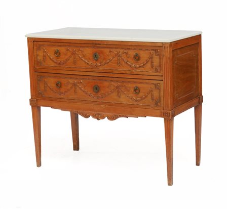 Antico comoncino in legno di frutto a due cassetti intagliati a nastri e...