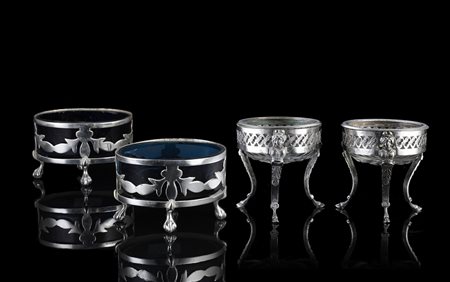 Lotto composto da due coppie di saliere in argento con vaschetta in vetro,...