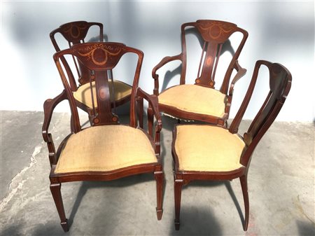 Gruppo di quattro sedie di cui due con braccioli decorate con filettature, fior