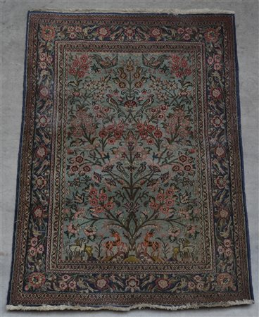 Tappeto Qum, Persia secolo XX.
Decoro con albero della vita con animali su fond