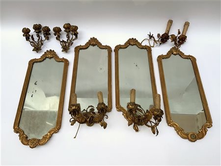 Gruppo di quattro piccole specchiere con cornici in legno intagliato, cui due m