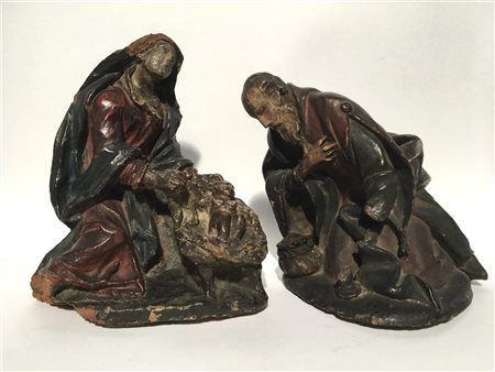 Lotto di due sculture in terracotta dipinta raffiguranti la Madonna col Bambino
