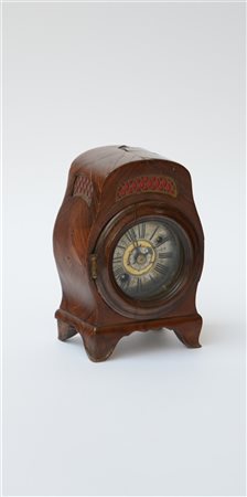 PIETRO DIBAUPAE
Orologio in metallo con quadrante a fascia con numeri romani, m