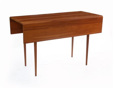 Tavolo in legno ad alette. Italia, produzione recente. (cm 122x77x55/100) (dife