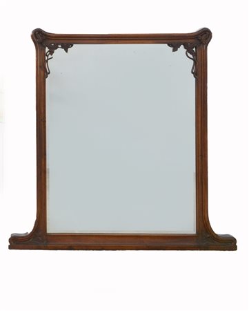 Caminiera art nouveau in legno di noce massello decorato con intagli floreali a