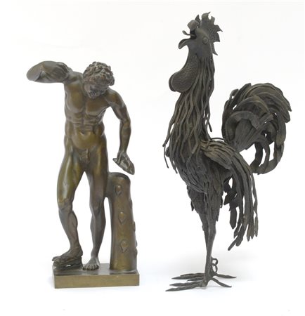 Lotto composto da una scultura in bronzo raffigurante "Discobolo" ed una in fer