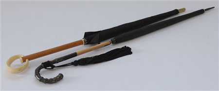 Lotto composto da due ombrellini da donna uno con manico in argento a finto bam