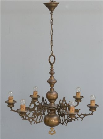 Lampadario "olandese" a sei luci in bronzo con bracci traforati e fusto tornito