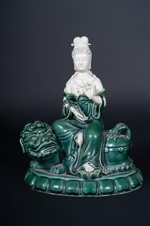 Arte Cinese  A fine green glazed porcelain figure of Manjusri on a lion China, early 20th century .