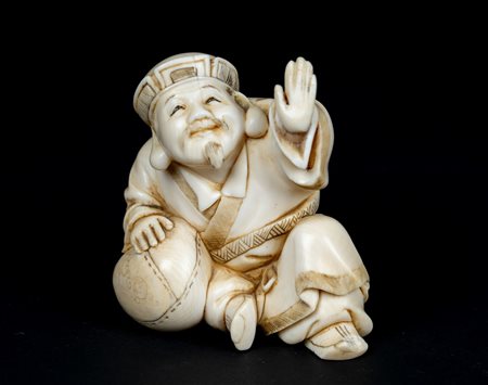 ARTE GIAPPONESE  An ivory figure. Signed at the base.Japan, 19th century .