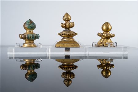 Arte Himalayana  Three gilded copper Stupa tipsTibet, 18th-19th century .