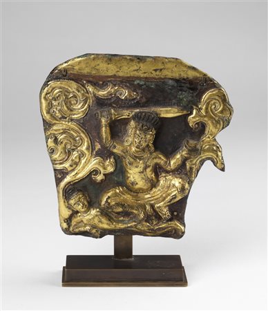Arte Himalayana  A gilt copper repoussé plaque depicting Acala Tibet, 15th-16th century .