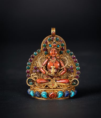 Arte Himalayana  A pendant decorated with a coral Amitayus figure Nepal, 20th century .
