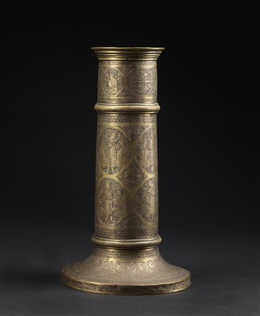 Arte Islamica  A brass Qajar torch stand Persia, 19th century .