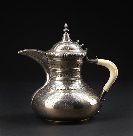 Arte Islamica  An Ottoman silver coffee pot with ivory handle Turkey, 19th century .