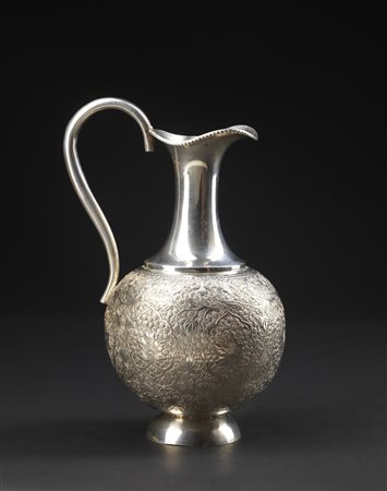 Arte Islamica  A silver jug engraved with floral motifs Persia, 19th century .