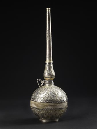Arte Islamica  An embossed silver and silver gilt gun powder bottlePossibly Algeria, 19th century .