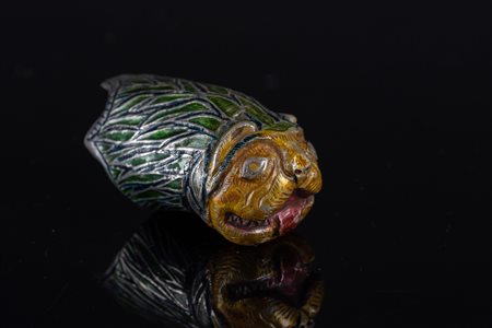 Arte Islamica  A metal enameled archer ring in the shape of a lion Northern India, 19th century .