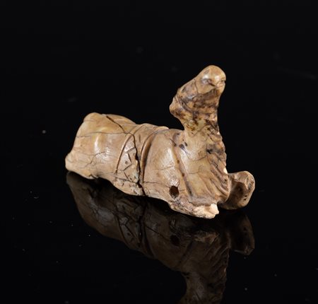 Arte Islamica  An ivory carving in the shape of a camelPossibly Egypt, 12th century or later .