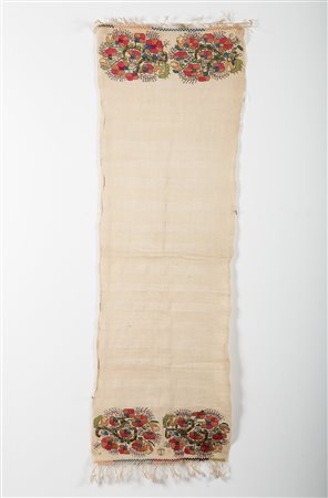 Arte Islamica  A linen fabric embroidered with metal thread with colorful stylized flowers at the ends Turkey, late 19th century.