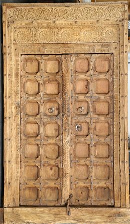Arte Islamica  A large carved wooden portal with double doorsMughal India, 17th century .