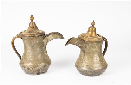 Arte Islamica  A pair of metal coffee pots Near East, 19th century .