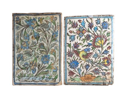 Arte Islamica  Two Persian pottery tiles painted with birds and flowers Iran, late 19th century .