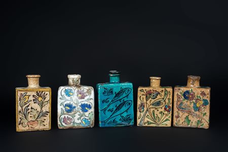Arte Islamica  A collection of five square pottery flasks painted with flowers Persia, 19th century .